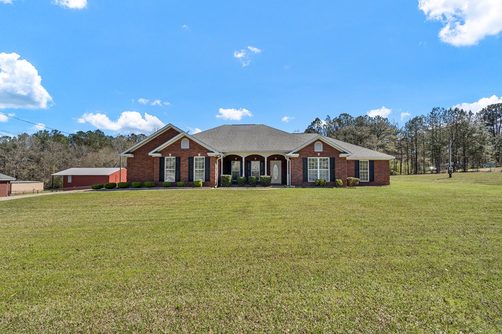 2034 Lee Road Salem, AL 36874 - Photo 38 of 47 a front view of a house with a garden