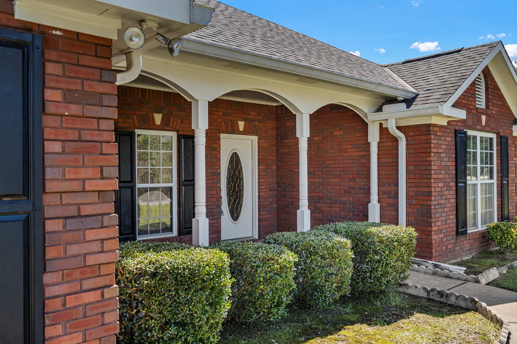 2034 Lee Road Salem, AL 36874 - Photo 39 of 47 a front view of a house with garden