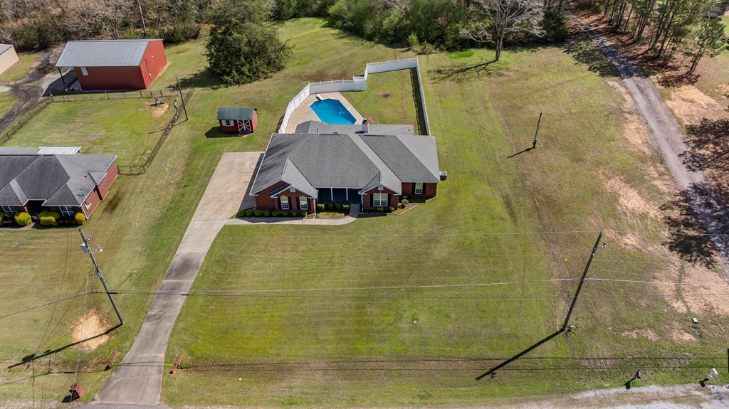 2034 Lee Road Salem, AL 36874 - Photo 40 of 47 a aerial view of a house with swimming pool and large trees