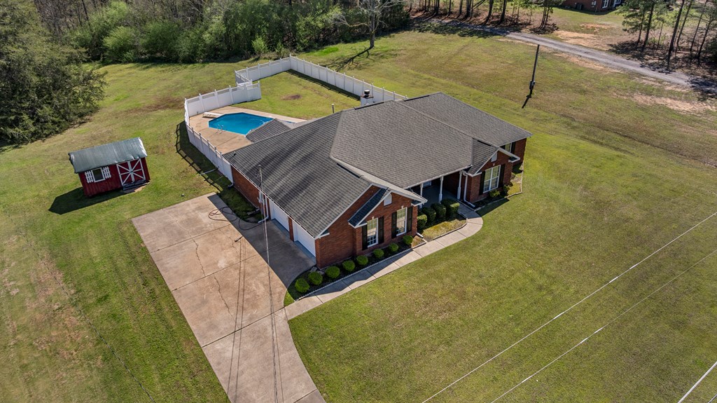 2034 Lee Road Salem, AL 36874 - Photo 44 of 47 an aerial view of a house with swimming pool
