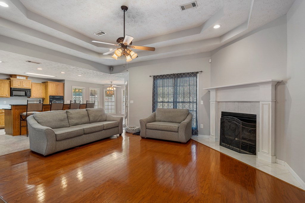 2034 Lee Road Salem, AL 36874 - Photo 5 of 47 a living room with furniture and a fireplace