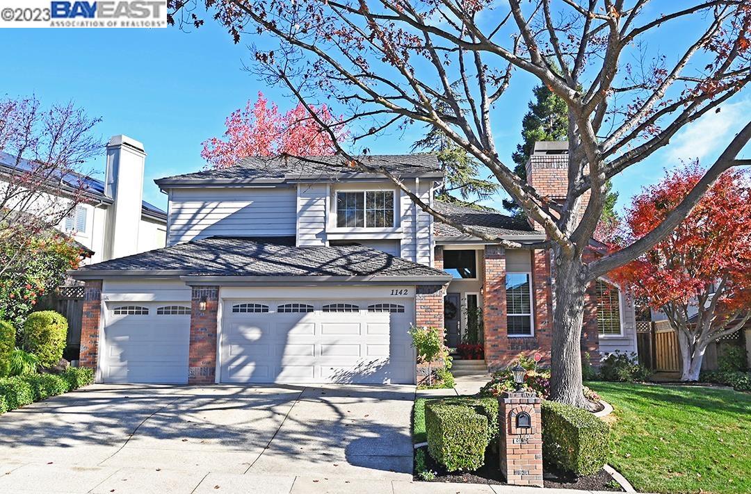 1142 Canyon Hills Road San Ramon, CA 94582 - Photo 1 of 1 a front view of a house with garden