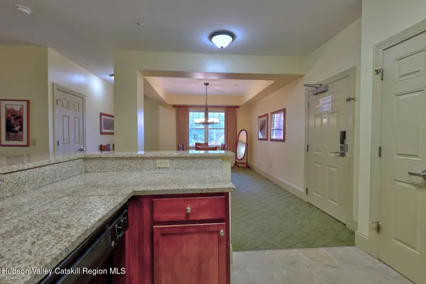 a view of a kitchen cabinets and a counter place