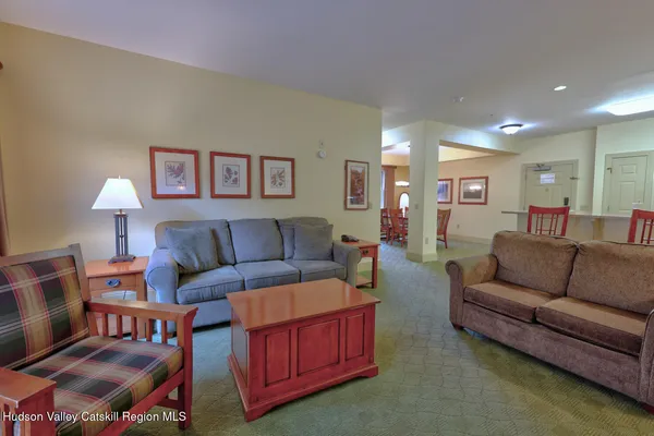 a living room with furniture and a couch