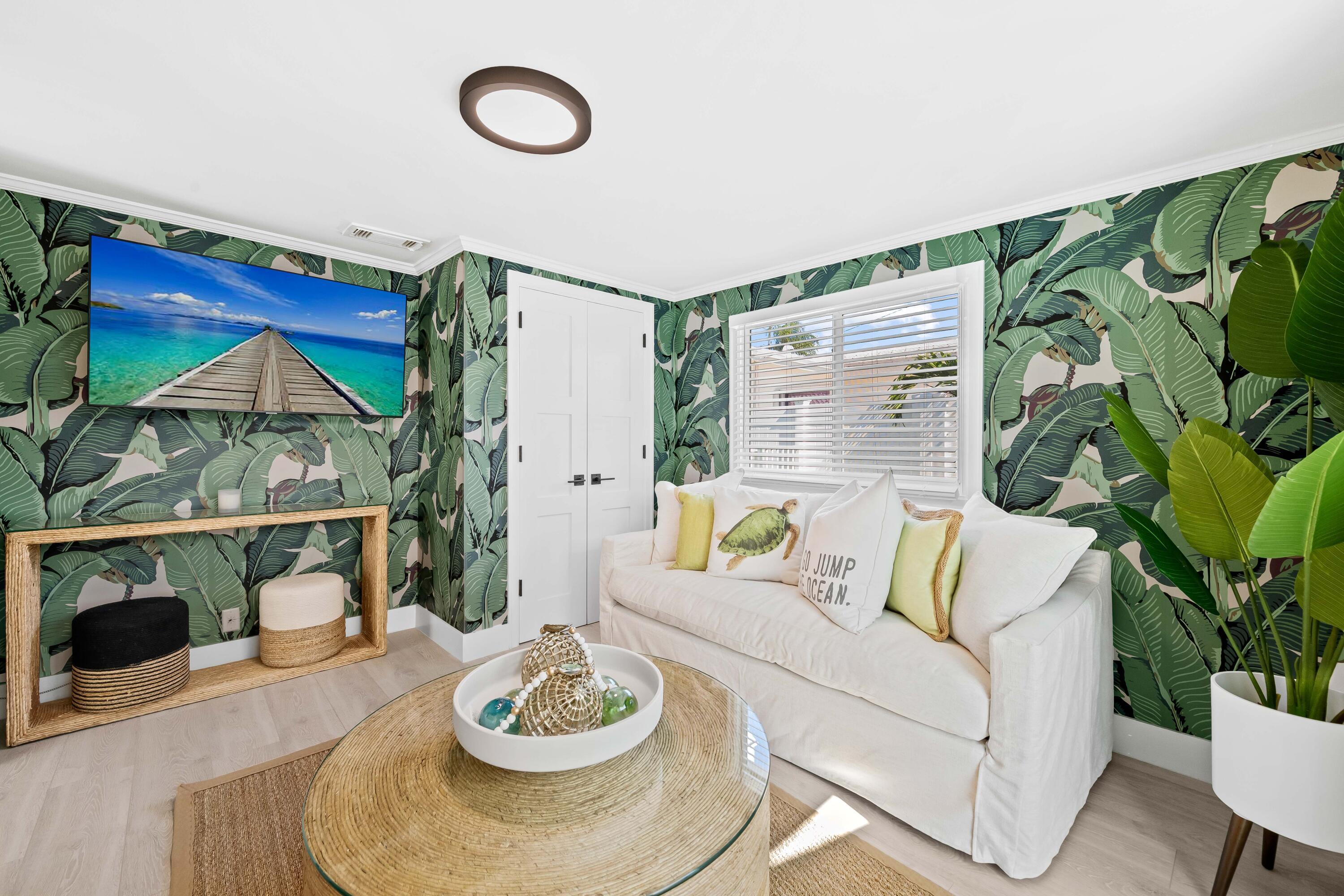 698 West Camino Boca Raton, FL 33486 - Photo 17 of 30 a living room with furniture and a fireplace