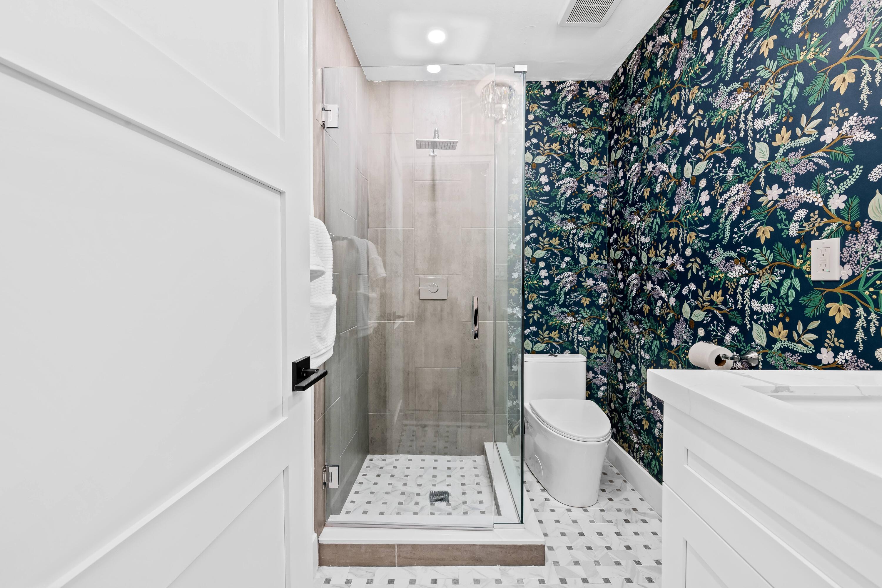 698 West Camino Boca Raton, FL 33486 - Photo 19 of 30 a bathroom with a sink toilet and shower