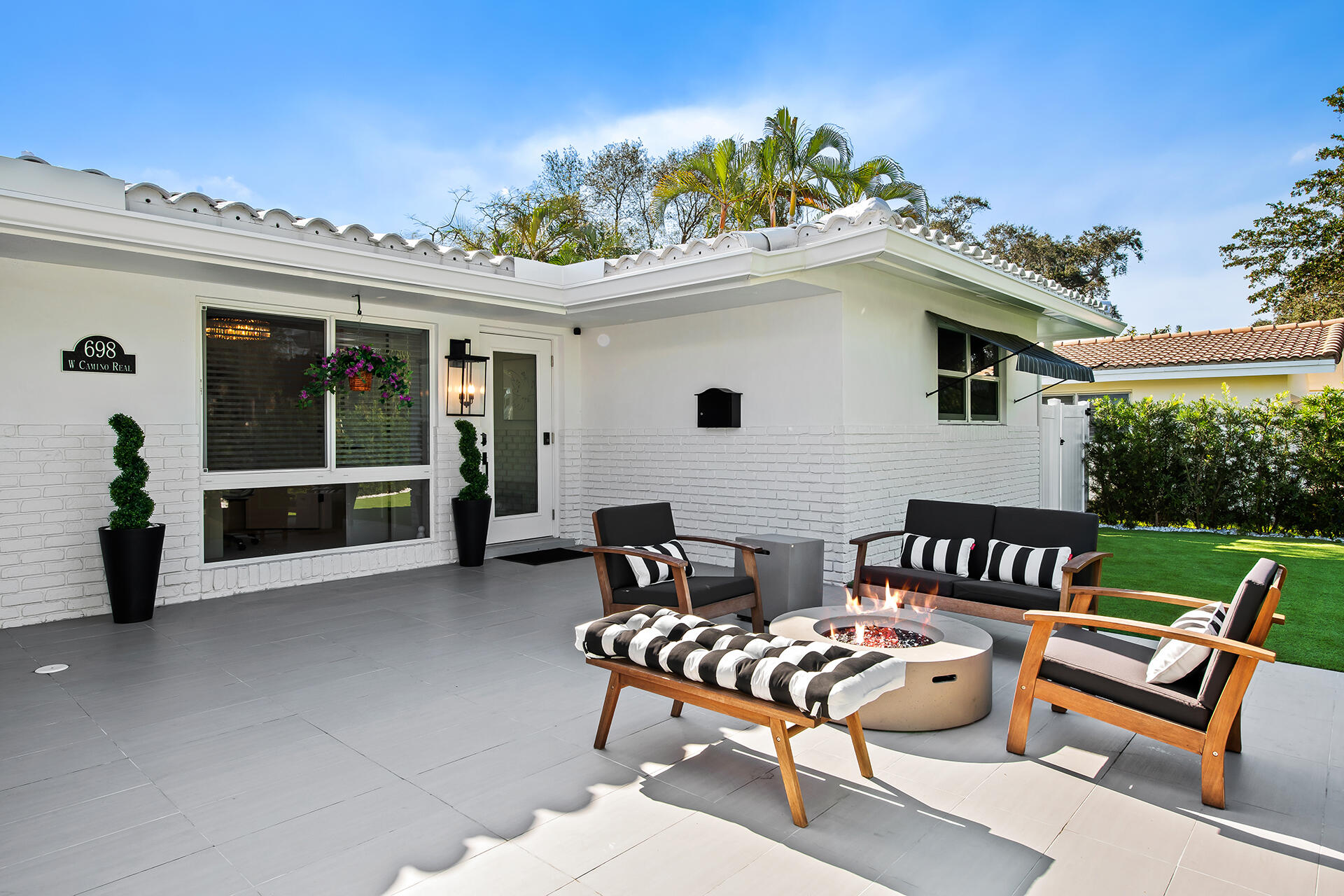 698 West Camino Boca Raton, FL 33486 - Photo 28 of 30 a view of a patio with a table and chairs