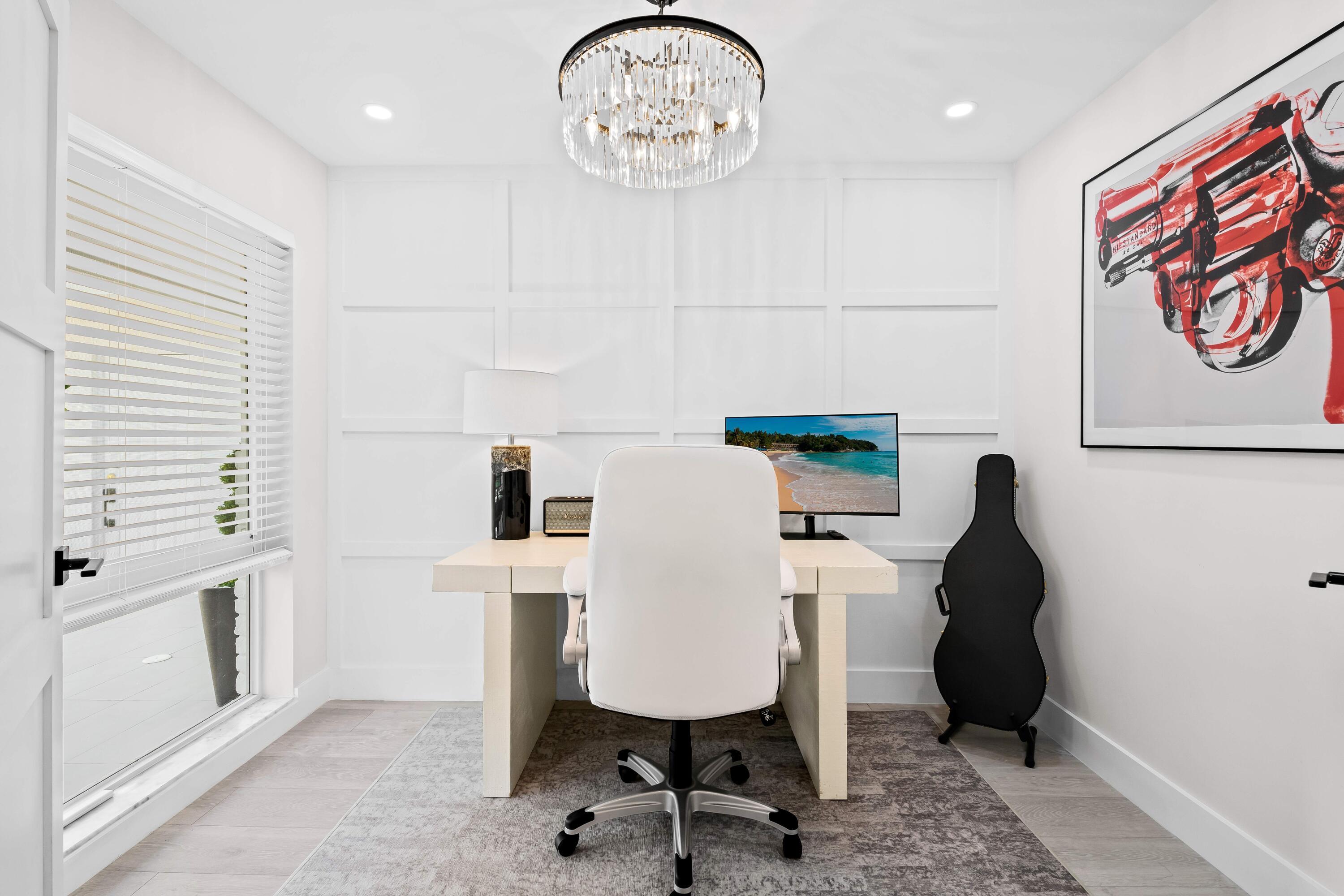 698 West Camino Boca Raton, FL 33486 - Photo 6 of 30 a view of a workspace with furniture