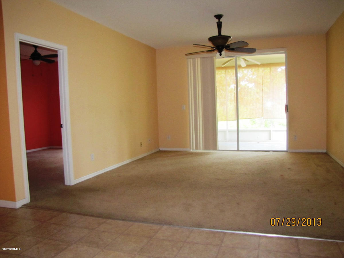 970 Riviera Point Drive Rockledge, FL 32955 - Photo 5 of 14 FAMILY ROOM V1