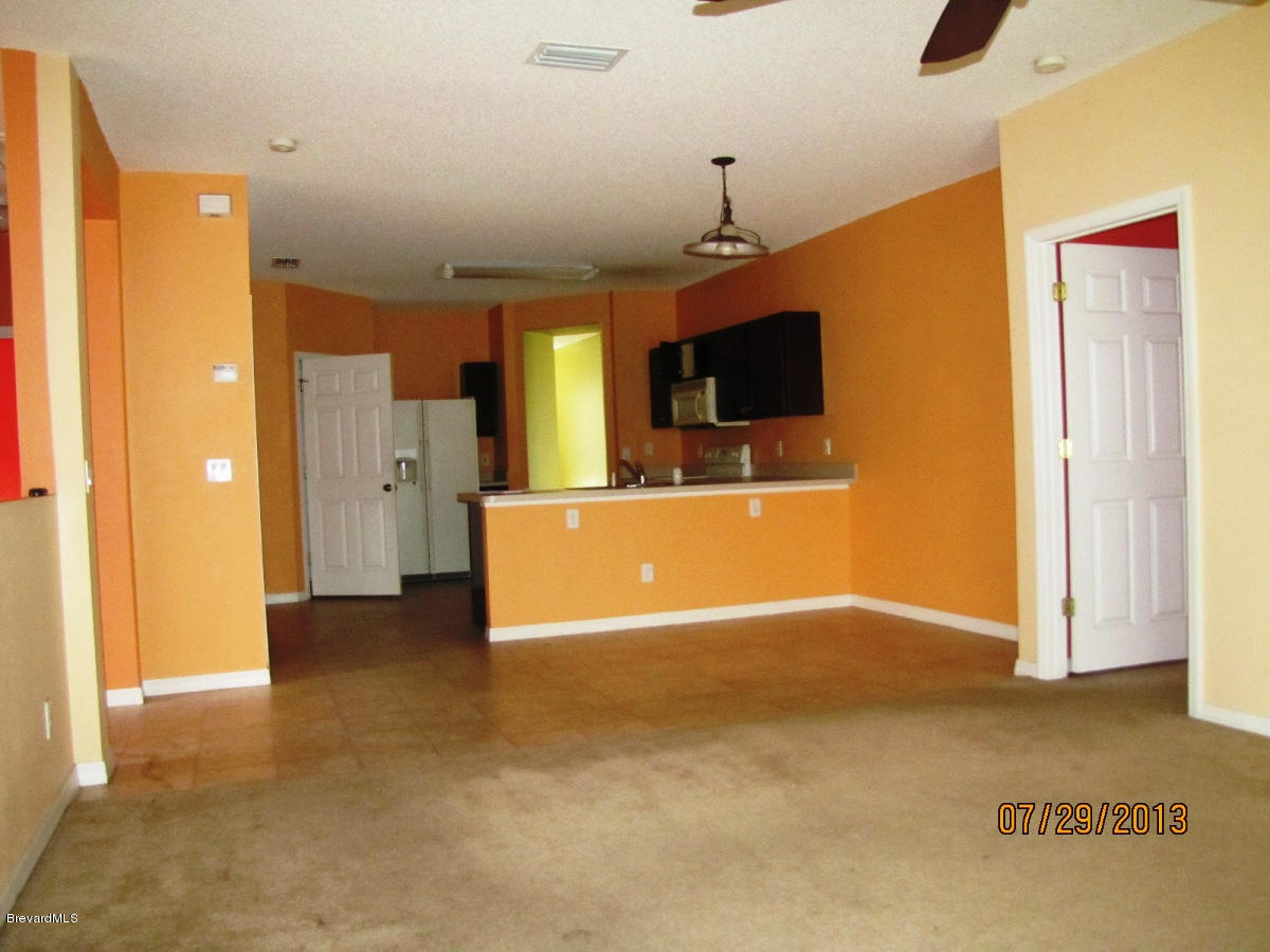 970 Riviera Point Drive Rockledge, FL 32955 - Photo 7 of 14 FAMILY ROOM V3