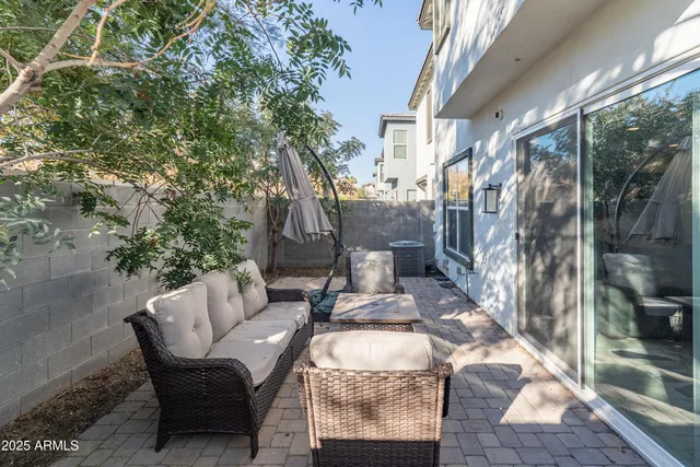 a building outdoor space with patio furniture