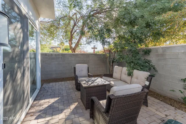 a view of a chairs in the patio