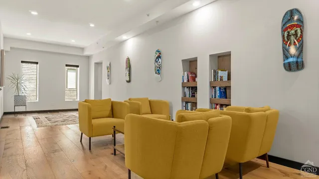 a bedroom with a bed and a mirror