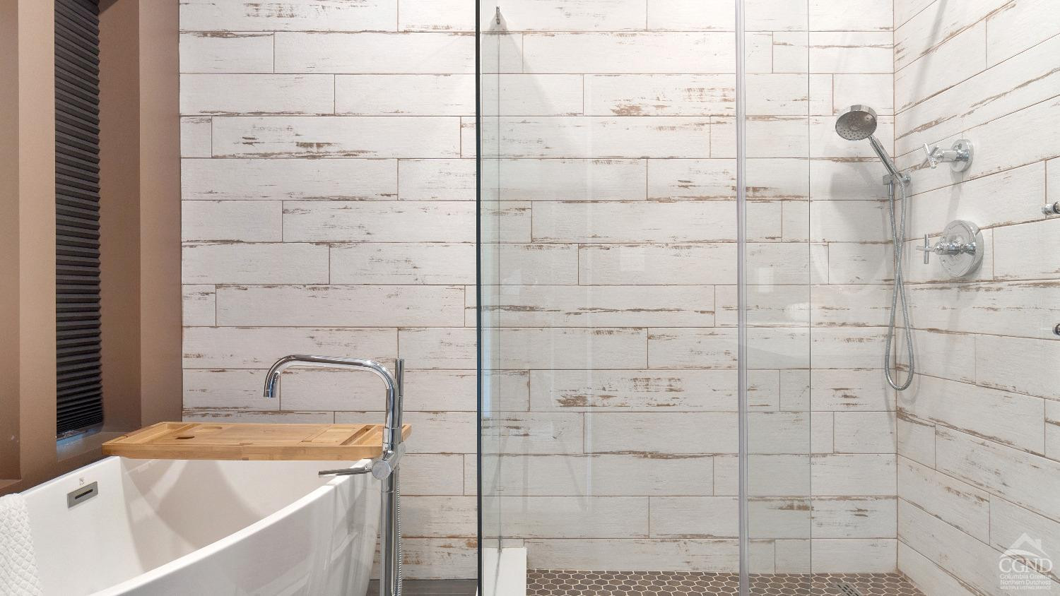 7717 Main Street Hunter, NY 12442 - Photo 29 of 55 a bathroom with shower and bathtub