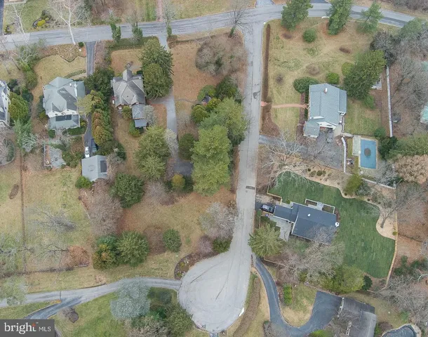 an aerial view of a house with outdoor space