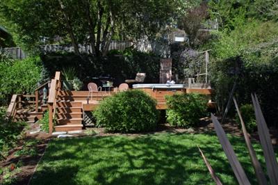 30 Millard Road Larkspur, CA 94939 - Photo 8 of 11 Back level lawn facing deck with spa.
