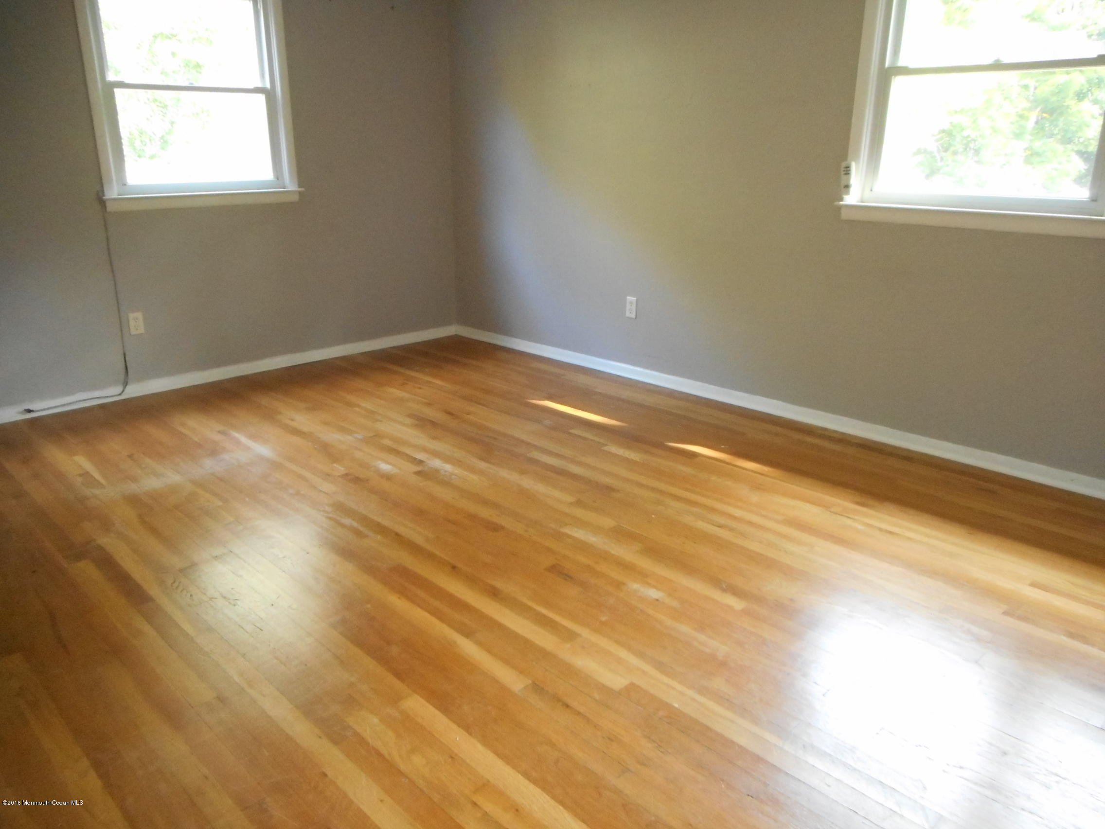 104 Bar Harbor Road Freehold, NJ 07728 - Photo 4 of 18 a view of an empty room with a window