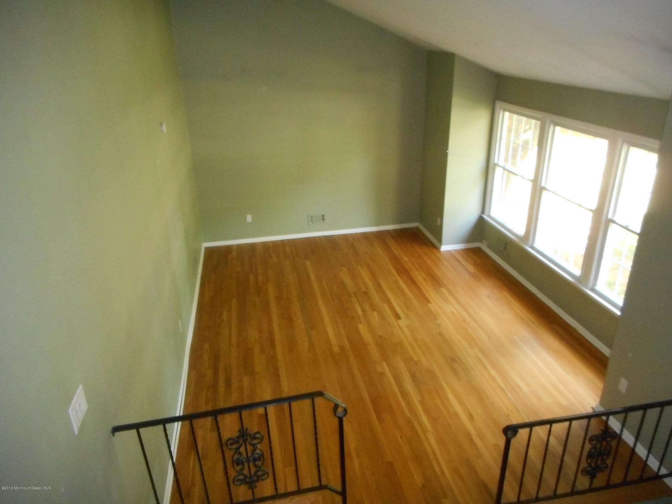 104 Bar Harbor Road Freehold, NJ 07728 - Photo 8 of 18 a view of wooden floor