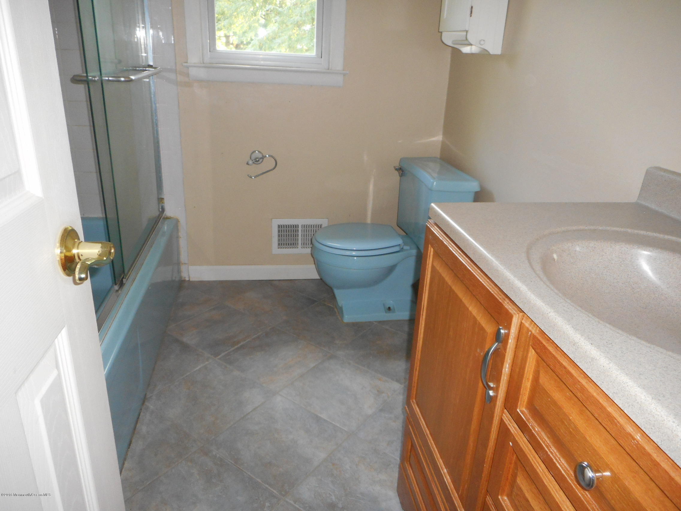 104 Bar Harbor Road Freehold, NJ 07728 - Photo 9 of 18 a bathroom with a sink and toilet