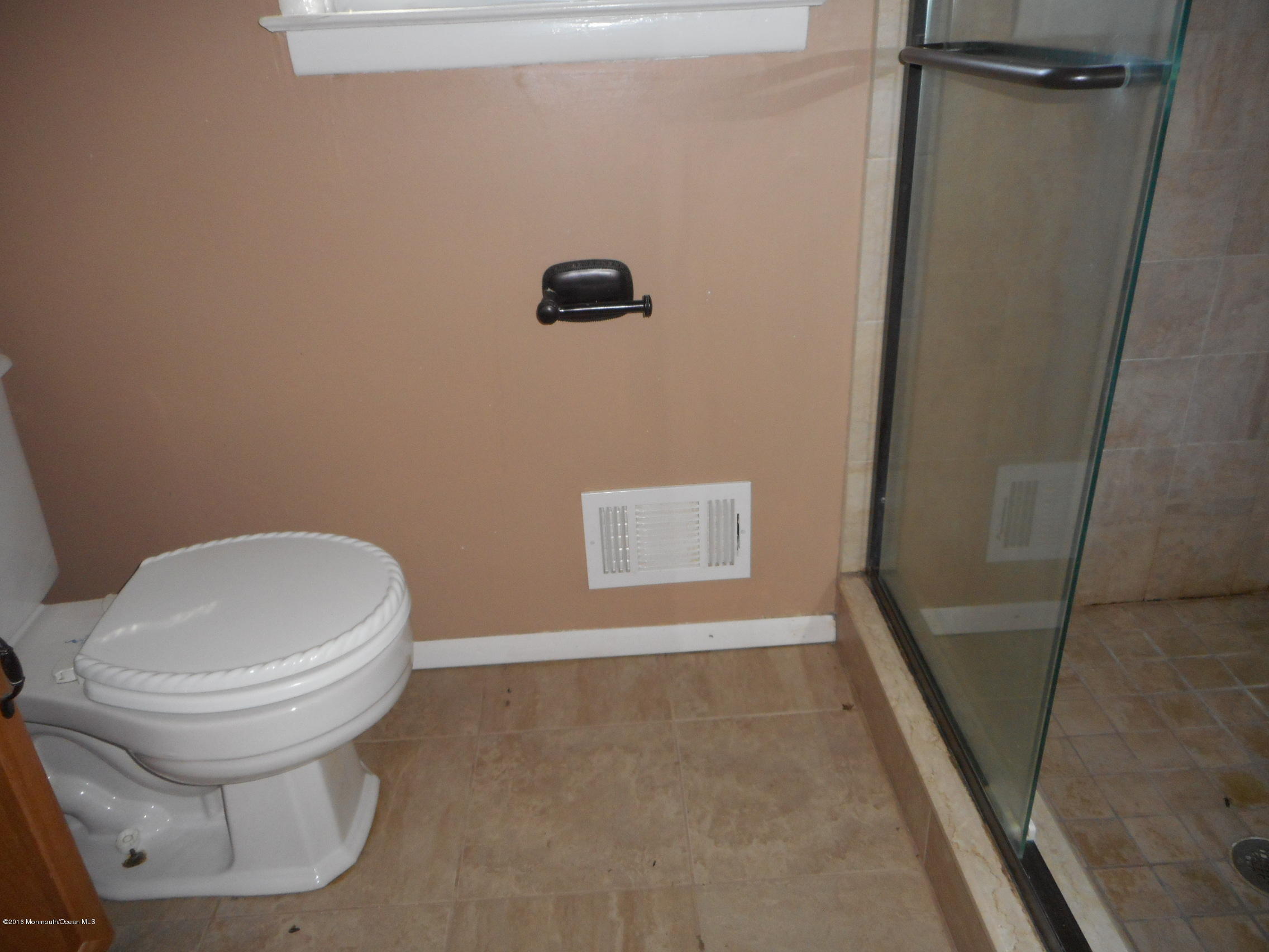 104 Bar Harbor Road Freehold, NJ 07728 - Photo 10 of 18 a bathroom with a toilet and a shower
