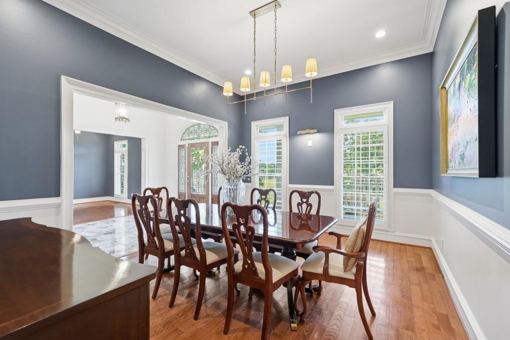 774 Bray Road Southwest Calhoun, GA 30701 - Photo 11 of 106 a view of a dining room with furniture window and wooden floor