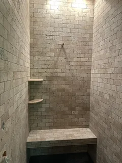 a bathroom with a sink and a shower