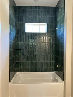 a bathroom with a bathtub