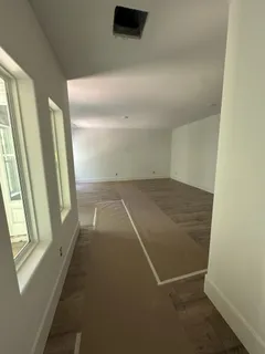 an empty room with windows