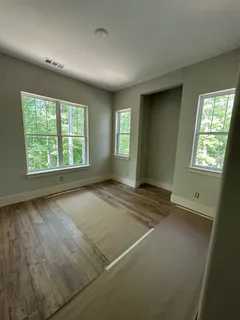 an empty room with windows