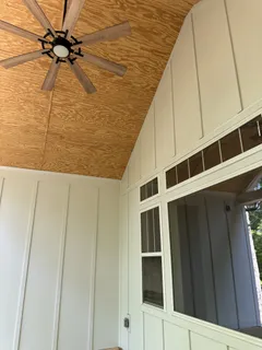 a balcony view with a glass door