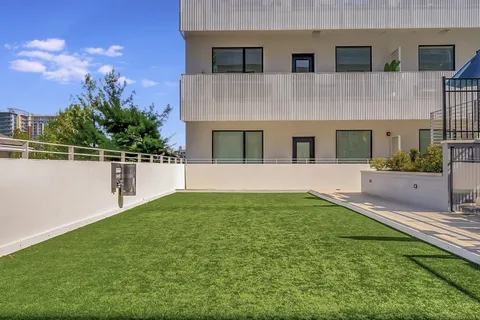 a house view with a garden space