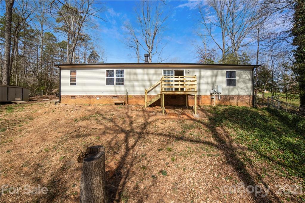 404 Rutledge Road Mount Holly, NC 28120 - Photo 35 of 40 front view of a house with a yard