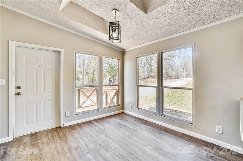 404 Rutledge Road Mount Holly, NC 28120 - Photo 10 of 40 a view of an empty room with a window