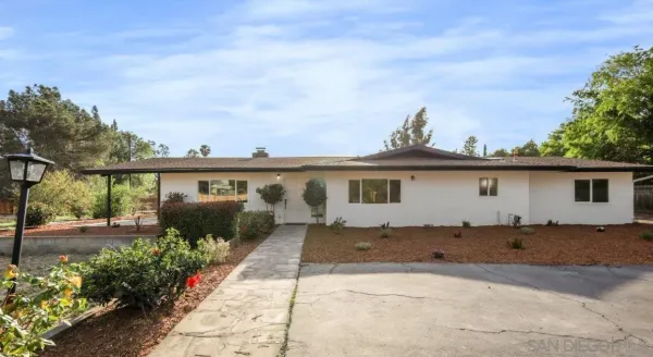 a view of a house with a patio