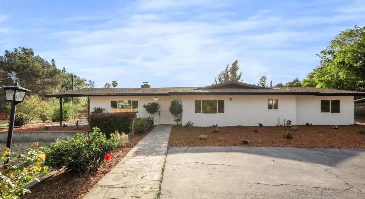 a view of a house with a patio