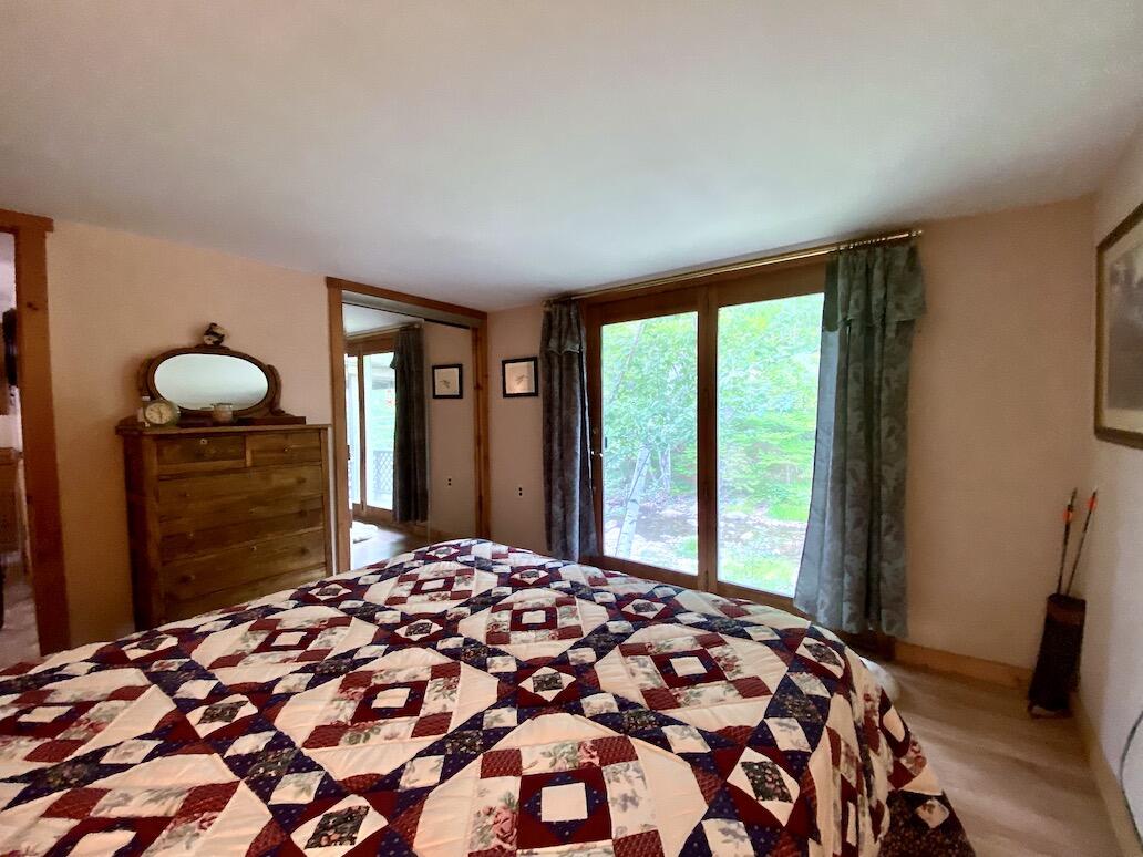 2709 Rangeley Road Madrid Township, ME 04966 - Photo 19 of 54 Primary Bedroom