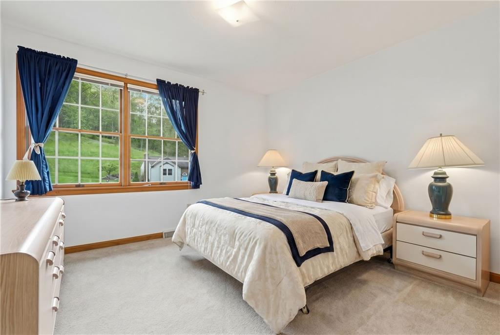 114 Sika Drive Pittsburgh, PA 15239 - Photo 30 of 45 a bed room with a bed and a window