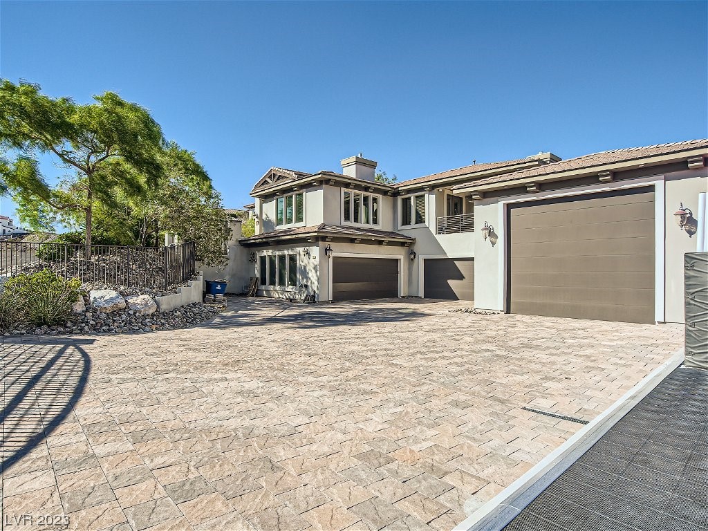 1164 Christian Road Henderson, NV 89002 - Photo 4 of 93 Expansive and fully gated motor court leading to RV parking/up to 14 car garage