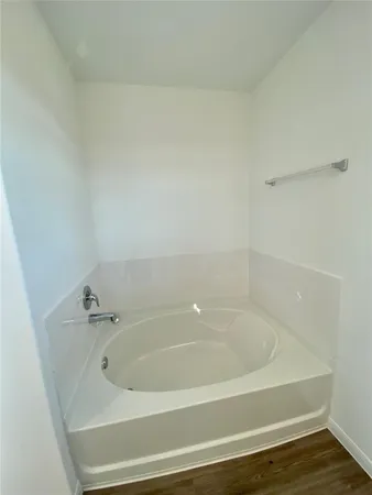 a bathroom with bathtub