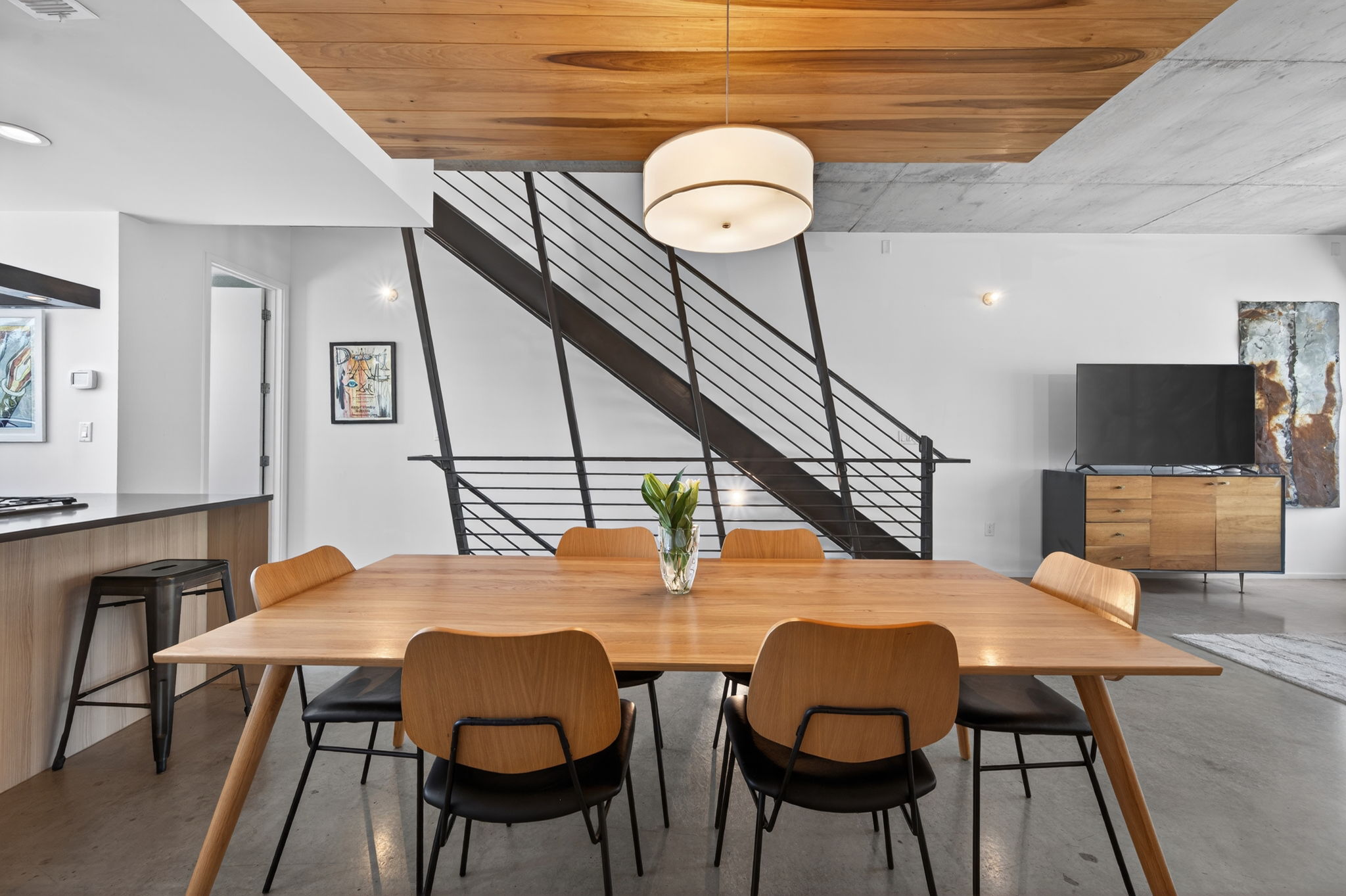 2301 South 5th Street, Unit 25 Austin, TX 78704 - Photo 12 of 35 Dining space with finished concrete floors