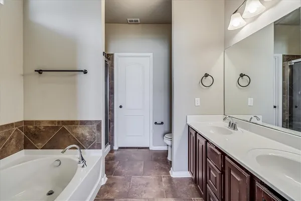 a bathroom with a sink and a bathtub