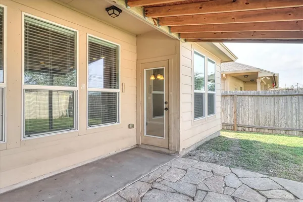 a view of a backyard with a garden