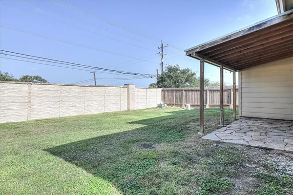 a view of a backyard with a garden