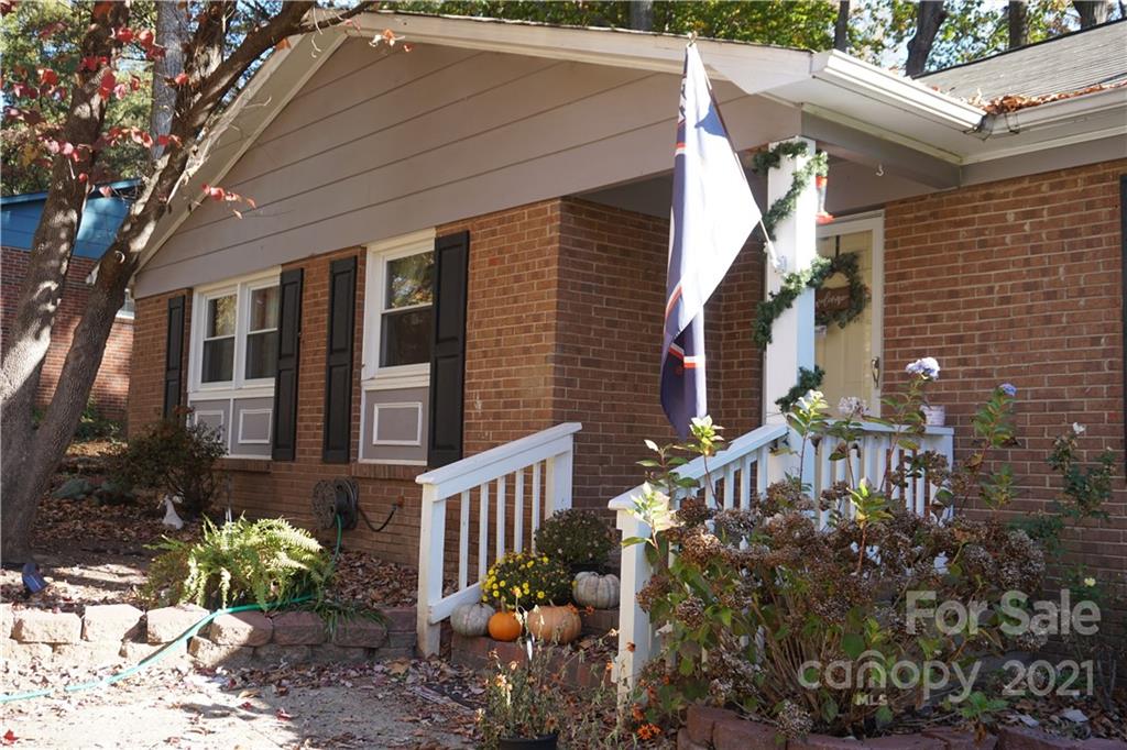10441 Rockwood Road Charlotte, NC 28215 - Photo 1 of 45 a front view of a house with plants