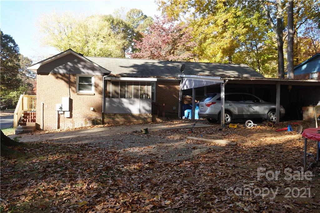 10441 Rockwood Road Charlotte, NC 28215 - Photo 11 of 45 a view of a house with backyard