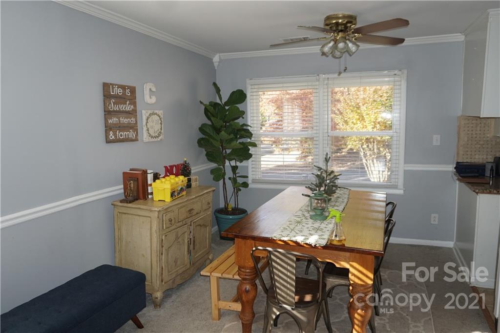 10441 Rockwood Road Charlotte, NC 28215 - Photo 20 of 45 a bed room with furniture and a window
