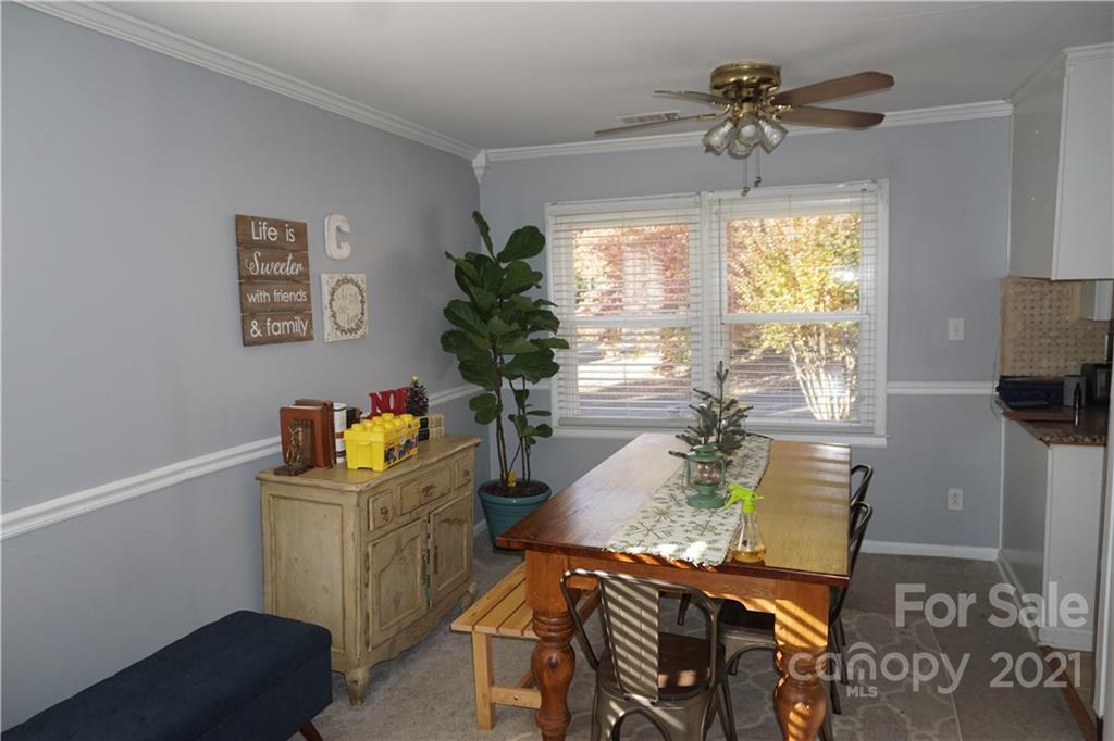 10441 Rockwood Road Charlotte, NC 28215 - Photo 23 of 45 a living room with furniture and a window