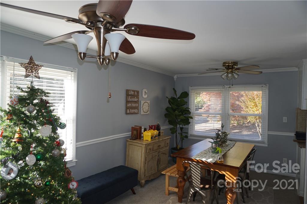 10441 Rockwood Road Charlotte, NC 28215 - Photo 24 of 45 a bedroom with furniture and a window