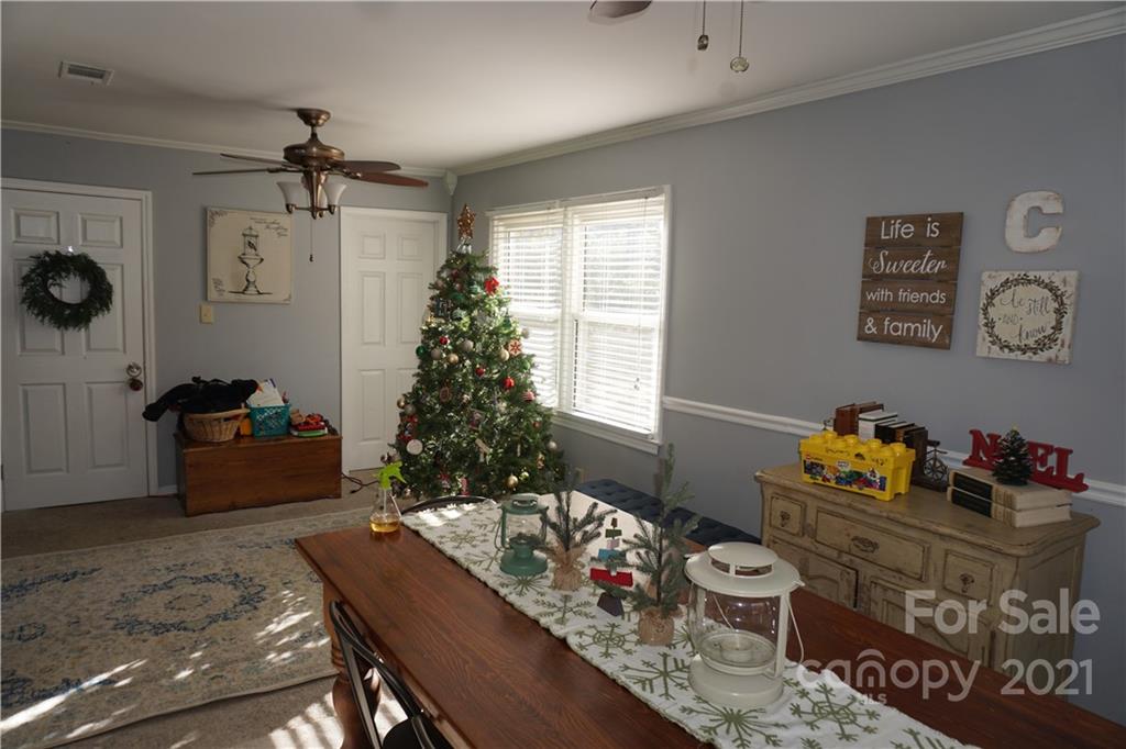 10441 Rockwood Road Charlotte, NC 28215 - Photo 27 of 45 a living room with furniture and a window