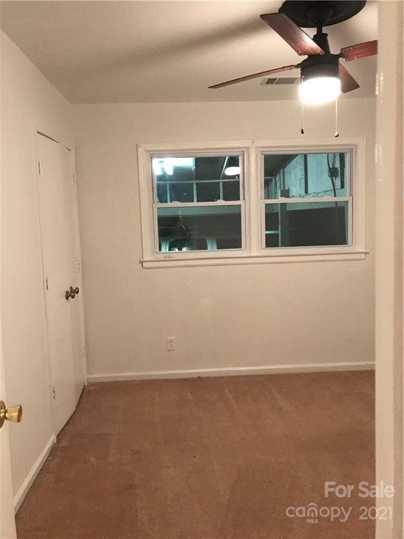 10441 Rockwood Road Charlotte, NC 28215 - Photo 37 of 45 a view of an empty room with a window